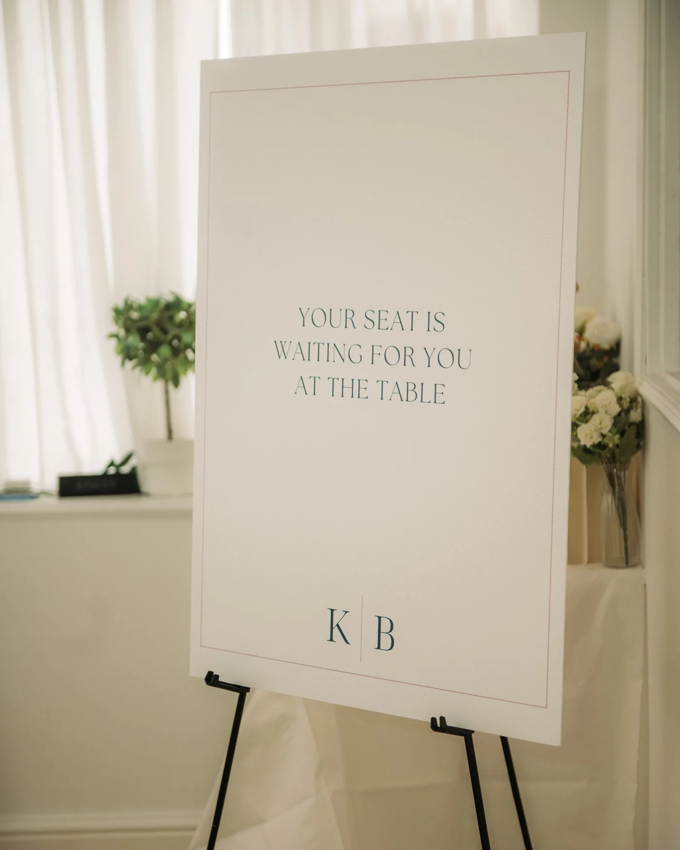 The Kaizen Brunch welcome sign, reading 'Your seat is waiting for you at the table'